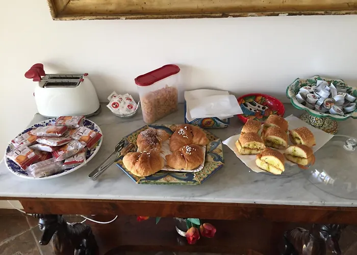 Alojamento de Acomodação e Pequeno-almoço Natoli 4*